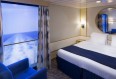 Imagen de un Camarote interior con balcón virtual del barco Navigator of the Seas